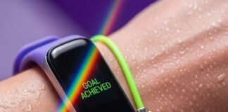 How Wearable Gadgets Are Revolutionizing Fitness A close-up of a sweaty wrist with a fitness tracker showing a rainbow.