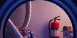 Dryer Vent Cleaning Gadgets That Prevent House Fires Lint trap glowing with cartoon flames in a messy laundry room.